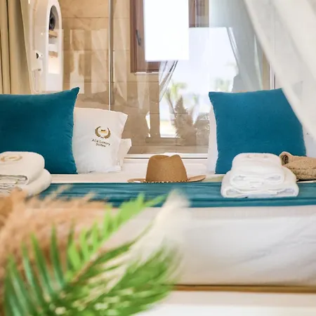 Alia Beachfront And Hotell 5*
